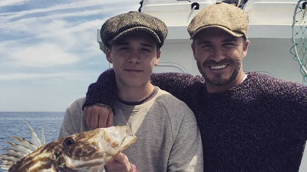 David and Brooklyn Beckham go sea fishing 2015.jpg